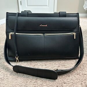 Black Laptop Bag with Sleek Design and Structured Style